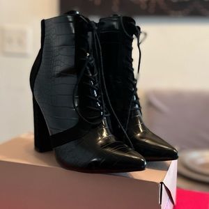 Leather suede ankle boots in black and one pair in chocolate brown.